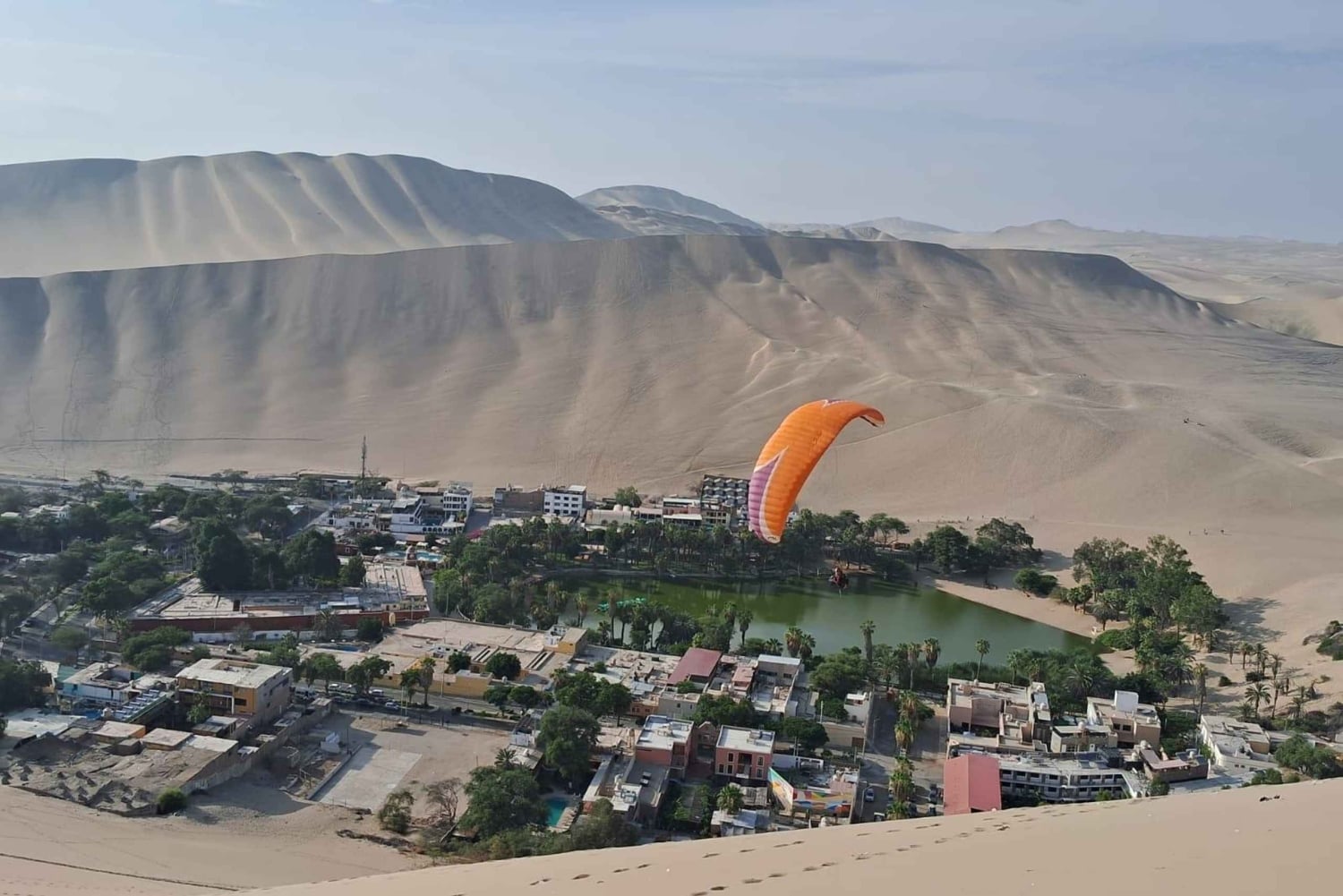 From Huacachina: Paragliding flight over the desert