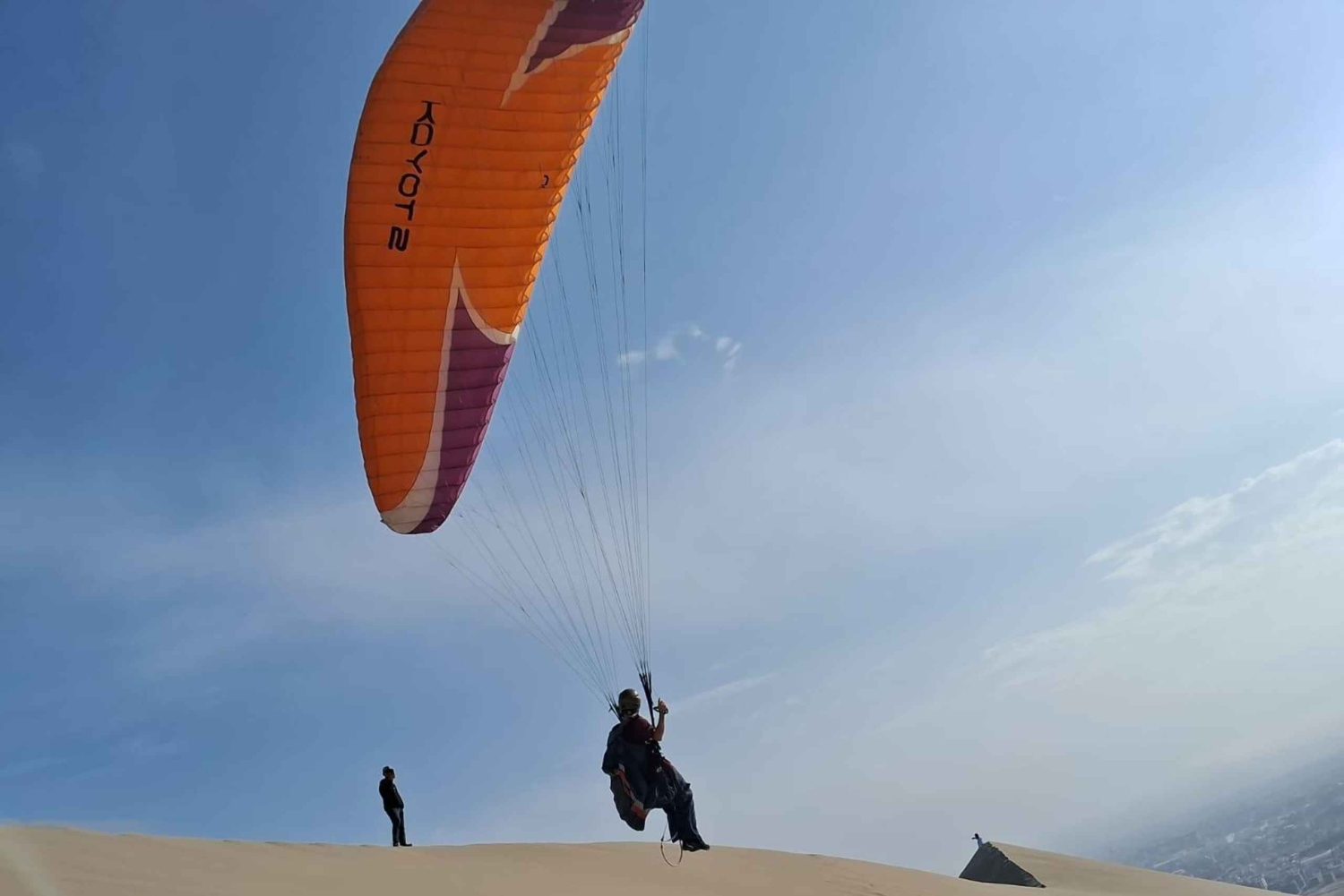 From Huacachina: Paragliding flight over the desert