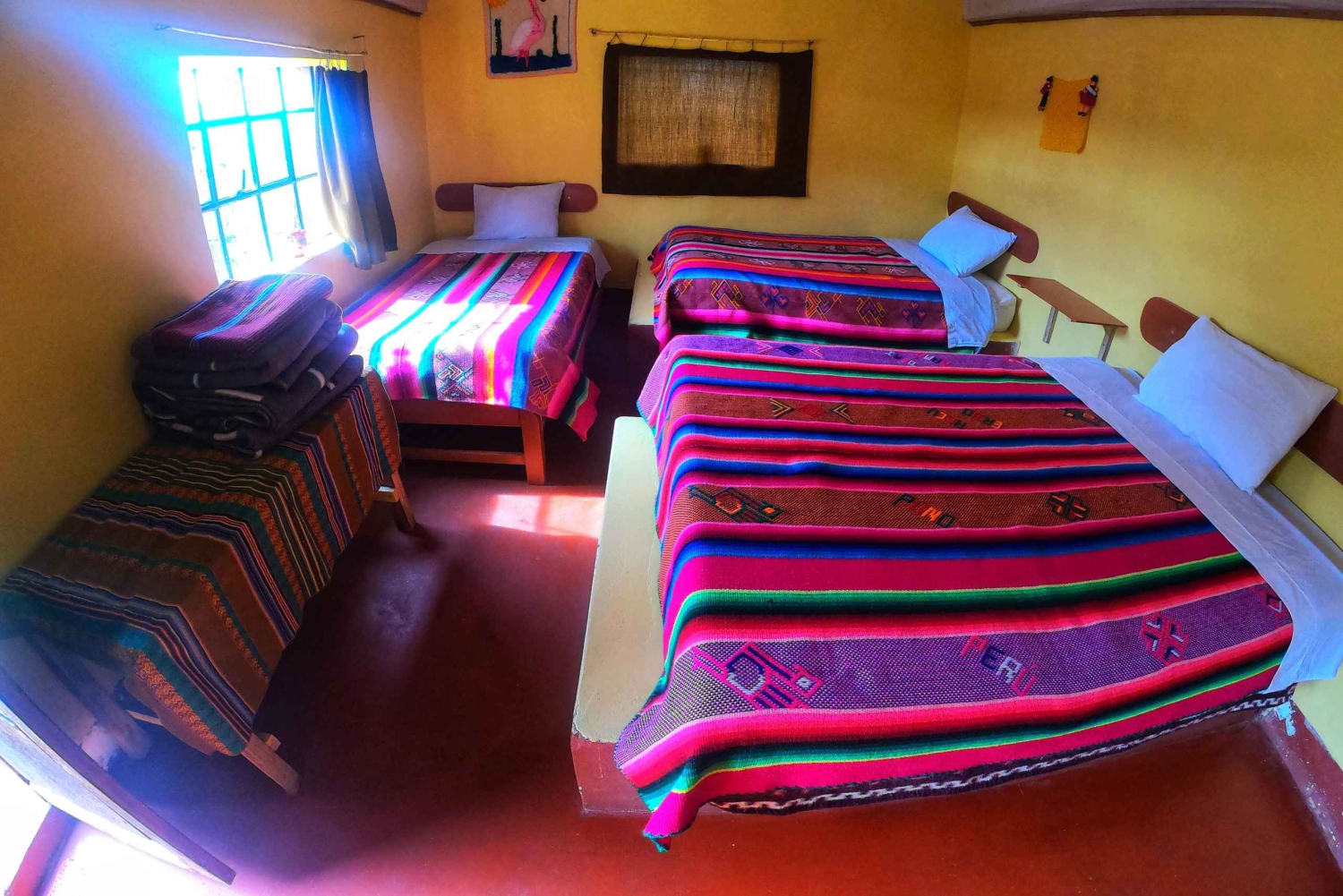 From Puno: 2-day Uros, Amantani, and Taquile tour with a folk show