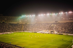 Lima: Enjoy a football game all included with a local guide