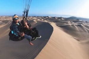 Paraglide over the desert and the Huacachina oasis
