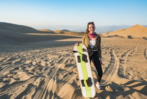 Sandboarding in the Ica Desert at Sunset