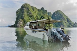 Phuket: Wycieczka grupową łodzią motorową o wschodzie słońca na wyspie Phi Phi