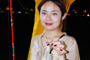 RedRiverTours - Disfrutar de la pesca de calamares al atardecer y por la noche