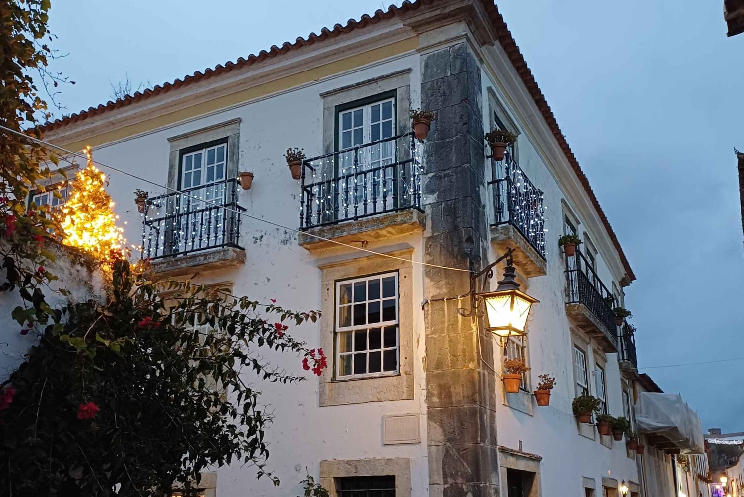 From Lisbon: Porto Transfer with Óbidos & Nazaré Tours