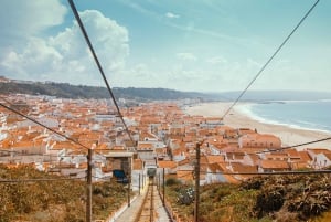 From Porto: Private Transfer to Lisbon with Stop at Nazaré