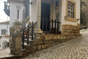 Lissabon: Transfer naar Porto met Obidos en Nazare