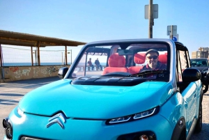 Porto: a ride along the coast in a fun eco-friendly car
