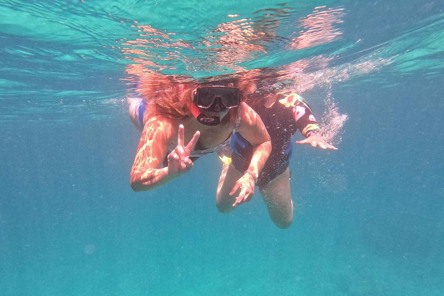 Icacos: Double Dip Power Catamaran Snorkling og strandtur