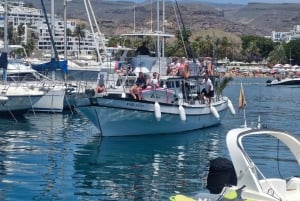 Puerto Rico, Gran Canaria: boat trip, drinks, food, paddle surfing, snorkeling.
