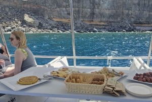 Puerto Rico, Gran Canaria: boat trip, drinks, food, paddle surfing, snorkeling.