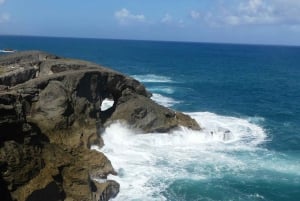 From San Juan: Cave of the Taino Indian Trek and Beach Tour