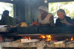 Preparing local delicacies at 'El Boricua'