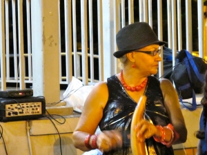 Playing the Güiro at Plaza Dársenas, Old San Juan