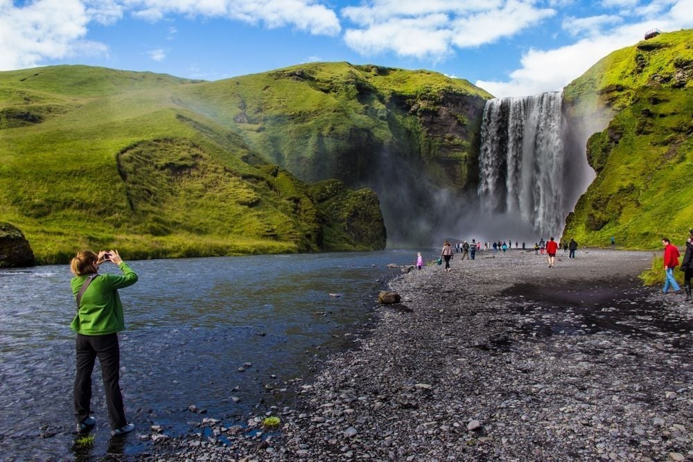 SkÃ³gafoss waterfall, on the South Coast, is a awe-inspiring and magnificent.
