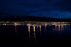Akureyri, Iceland, at night accross the ocean.