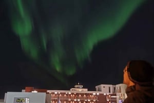 From Reykjavík: Spot the Northern Lights with Snacks & Drink