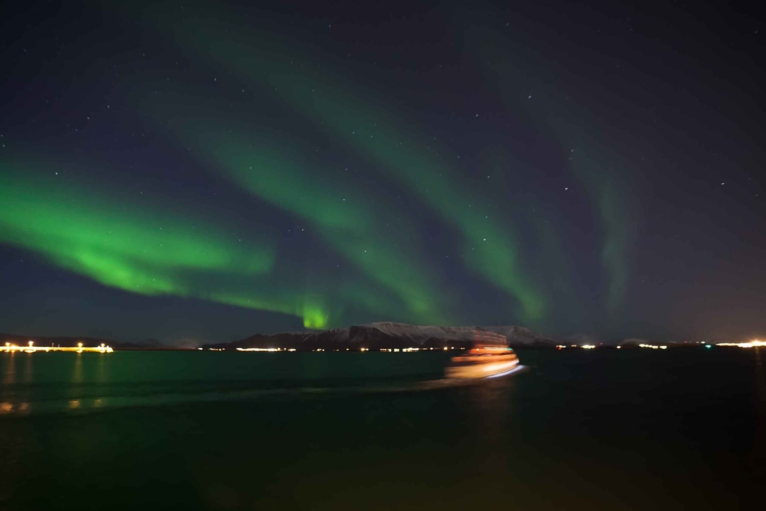 Reykjavik: 2 uur Noorderlicht per boot met back-up plan