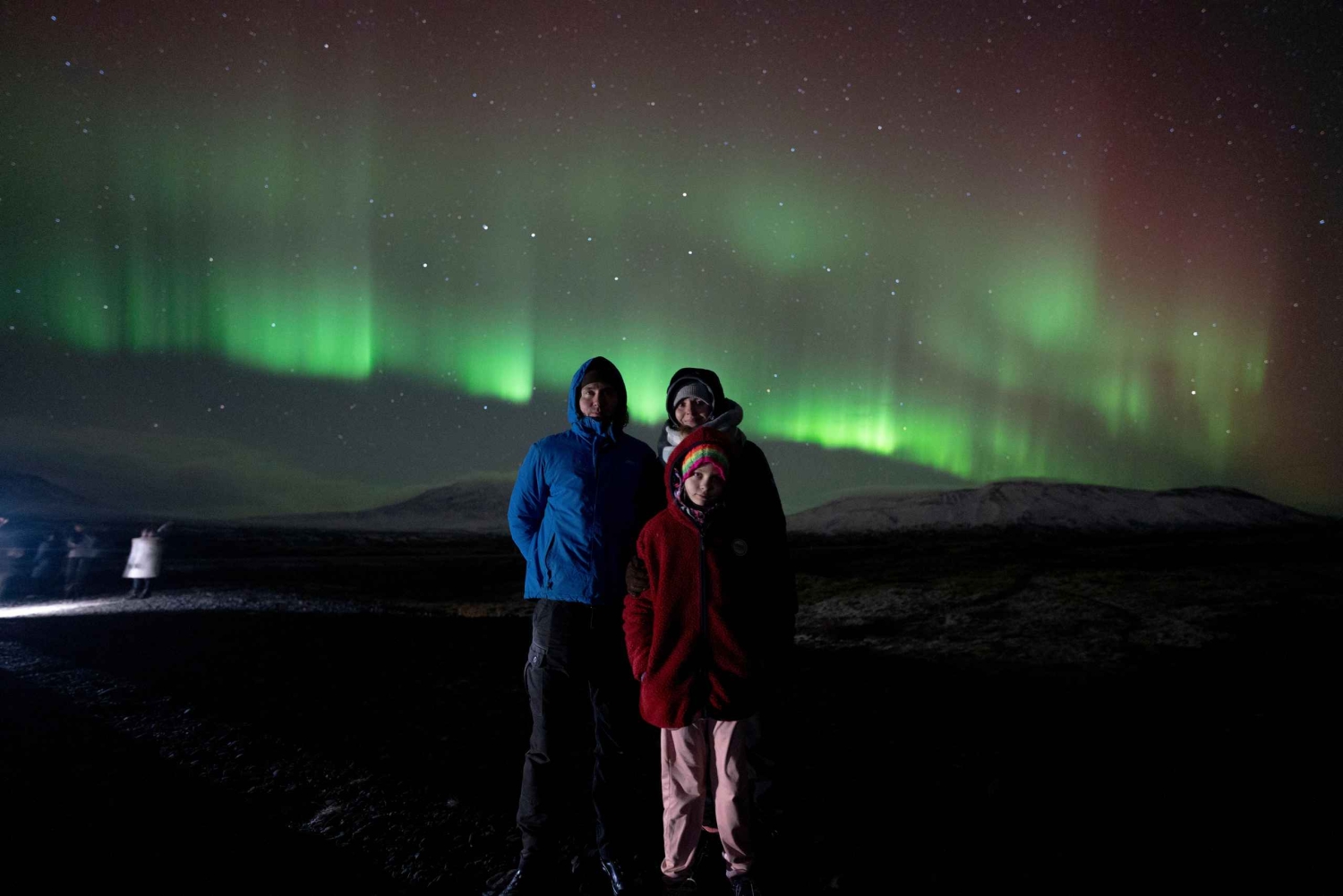 Reykjavik: aurora boreal em grupo pequeno com bebidas e presente