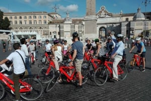 Highlights by Bike plus Colosseum Guided Tour