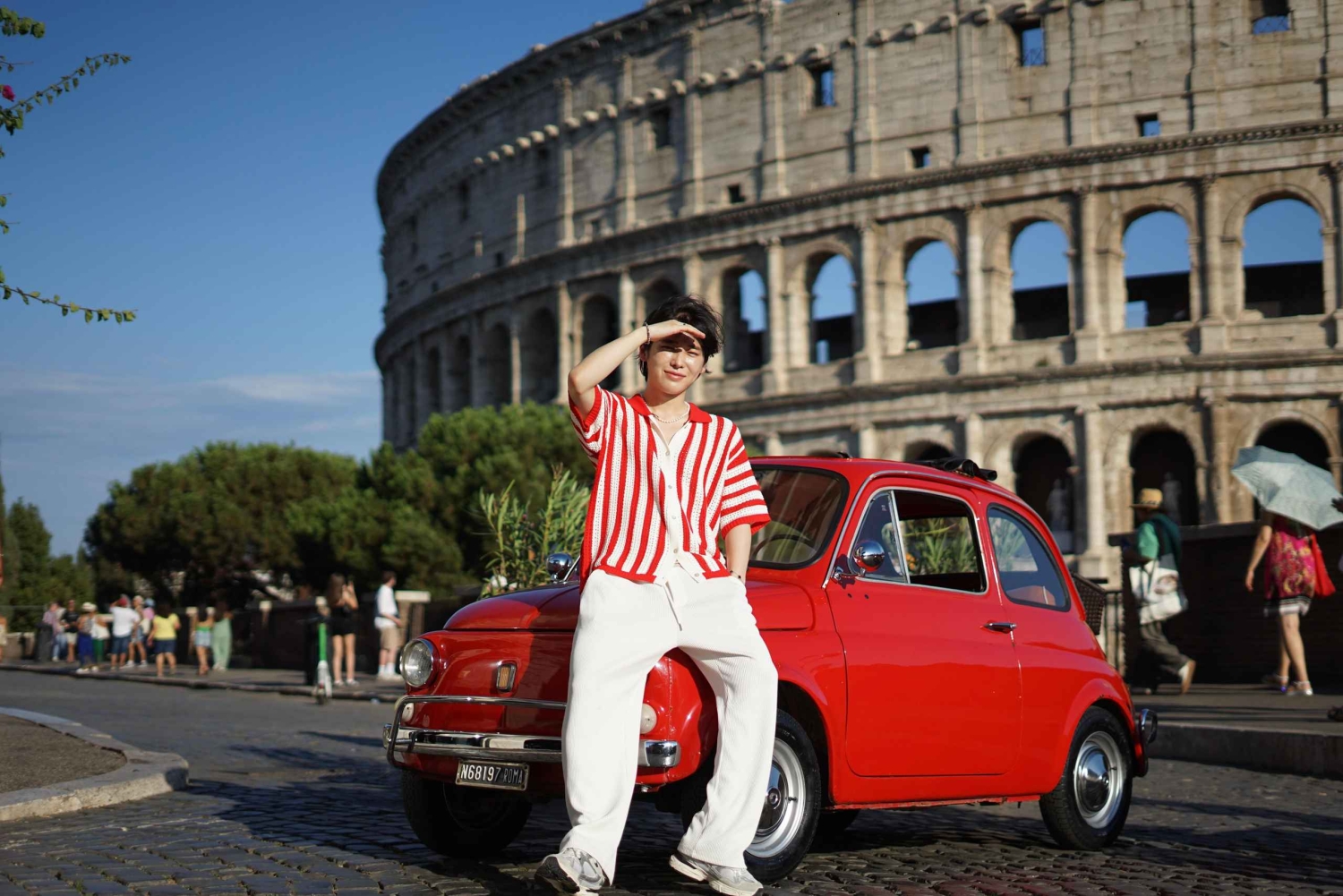 Usługa profesjonalnej sesji zdjęciowej w Rzymie z bezpłatnym transportem samochodem Fiat 500