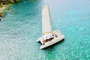 Porto Conte: Escursione in catamarano al tramonto con aperitivo