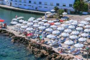 Porto Santo Stefano: La Caletta beach club - Cocktails under the umbrella