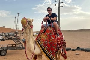 Rijad: czerwony piasek: jazda na ATV po wydmach, jazda na wielbłądzie i sandboarding