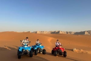 Rijad: czerwony piasek: jazda na ATV po wydmach, jazda na wielbłądzie i sandboarding