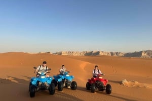 Rijad: czerwony piasek: jazda na ATV po wydmach, jazda na wielbłądzie i sandboarding