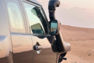 Rijad: czerwony piasek: jazda na ATV po wydmach, jazda na wielbłądzie i sandboarding