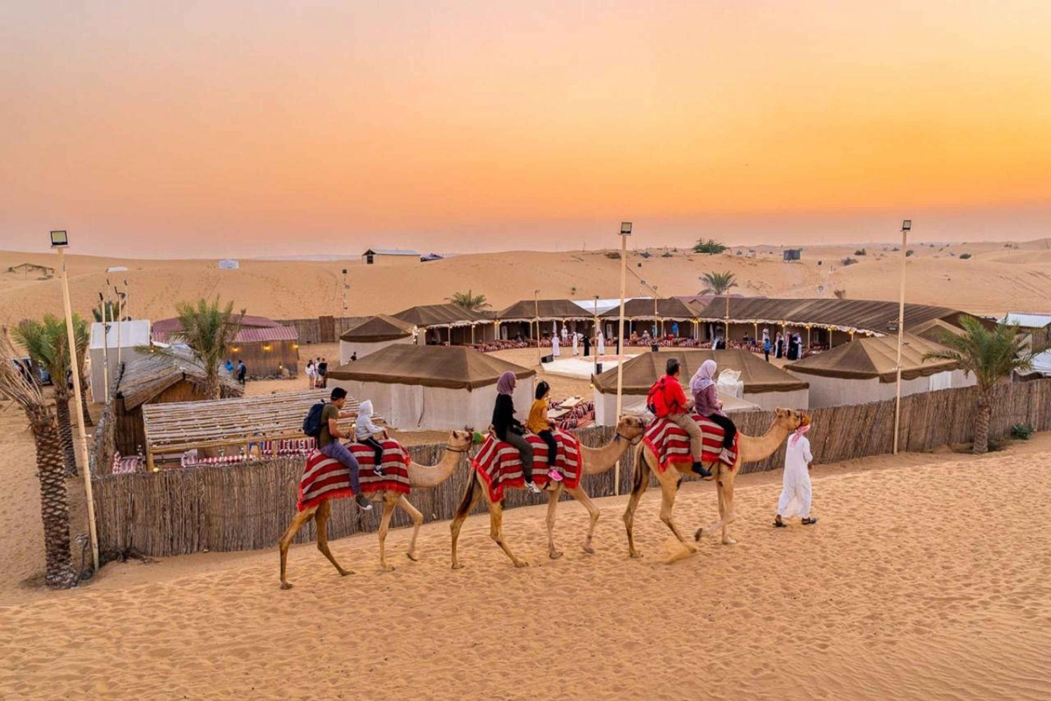 Dubai: Desert Safari, Camel Ride, Sandboard & Buffet Dinner