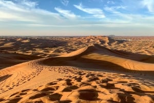 Rijad: czerwony piasek: jazda na ATV po wydmach, jazda na wielbłądzie i sandboarding