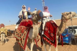 Riyadh: Kamelridning i de røde sandklitter, quadbike- og sandboardingeventyr