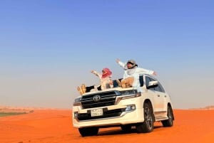 Riyadh: Tur til de røde sandklitter med quadbike og kameltur