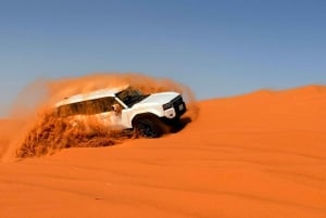 Riyadh: Tur til de røde sandklitter med quadbike og kameltur