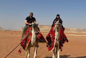Riyadh: Kamelridning i de røde sandklitter, quadbike- og sandboardingeventyr