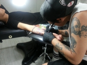 Tattooist Key in action