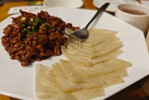 Shanghai: diner in het donker en nachtelijke cruise op de Huangpu-rivier