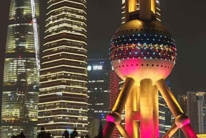 Shanghai: diner in het donker en nachtelijke cruise op de Huangpu-rivier