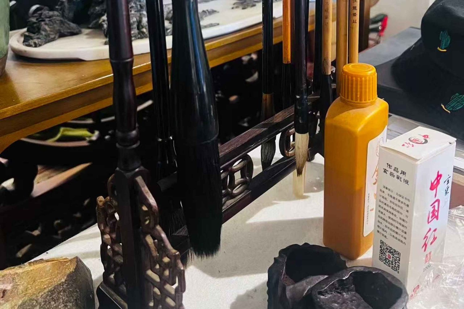 Shanghai: kalligrafie-les en dumpling-workshop