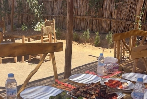 Поездка на верблюде по пустыне на закате, катание на сэндборде и ужин-барбекю