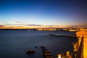 Boat tour of Ortigia at sunset with drinks included