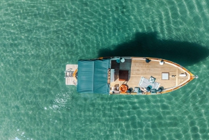 Bådture med Ocirne i bugten ved Naxos og Isola Bella