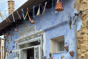 Borgo Parrini Gaudí-style: walking tour + optional tasting 2h, small group