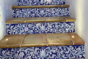 Borgo Parrini Gaudí-style: walking tour + optional tasting 2h, small group