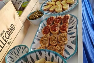 Cefalù: boat trip with fishing, coastal tour, and lunch on board with the catch