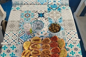 Cefalù: boat trip with fishing, coastal tour, and lunch on board with the catch