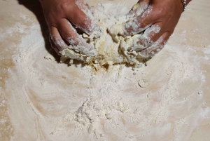 Cooking class we knead the dough with a Sicilian cook