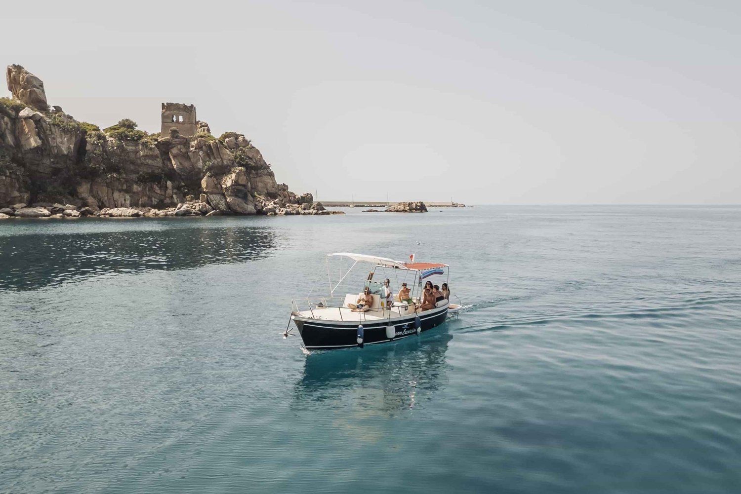 Day trips along the coast of Cefalù with swimming, snorkeling, and aperitif